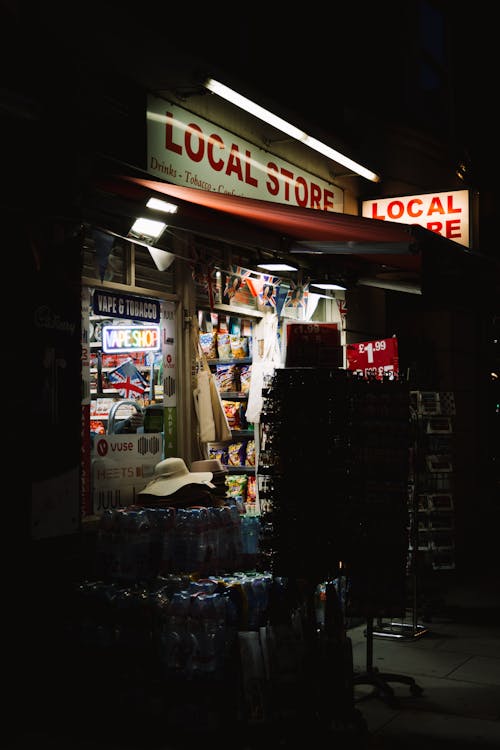 an illuminated tobacco and vape shop kiosk. merchant services in the vaping industry have expanded due to the 2018 farm bill.